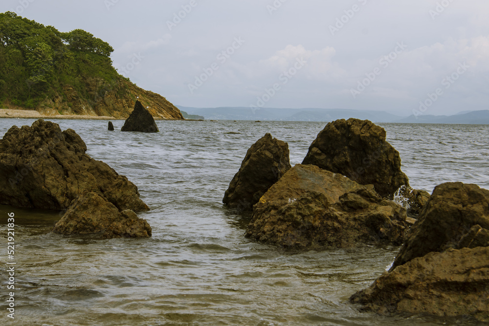 rocks protruding from the water