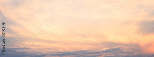 Soft image of sky in sunset with cloud. abstract nature background in retro color filter effect. © jakkapan