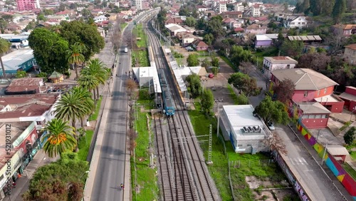 Aerial drone view of suburban railroad at Quilpue station, Valparaiso region, Chile. photo