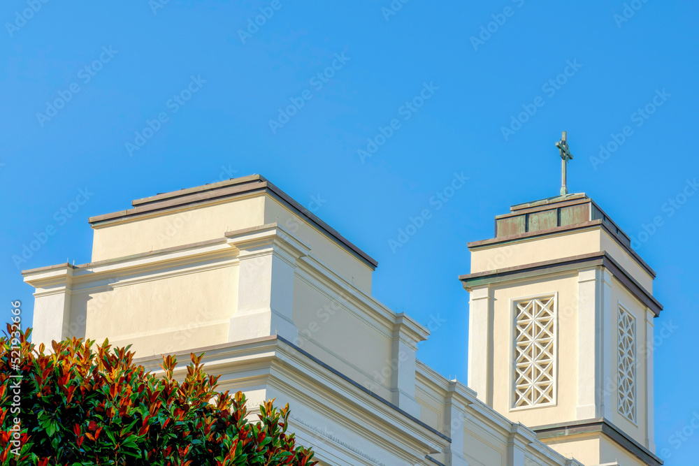 Fototapeta premium Top part view of a church with painted white concrete exterior at San Francisco, California