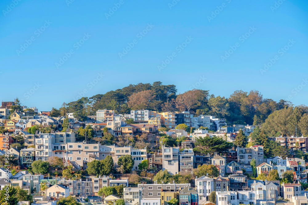 Different residential building structures on a slope of a moountain at San Francisco, CA