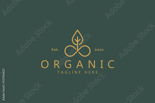 Premium Vector Organic Leaf Logo. Elegant Gold Color Symbol. Nature Plant Company Brand Identity. Unlimited and Infinity Combine Concept.