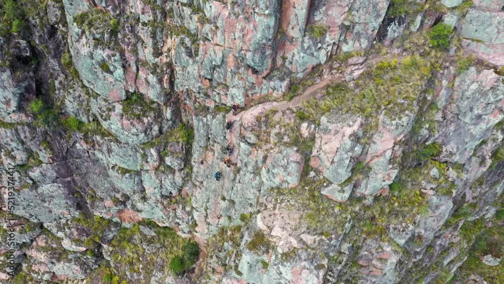 Drone shots of climbers at the Urubamba cliffs in Cusco, Peru. It is also known as the Sacred Valley. Climbers are climbing the mountain to their Airbnb. Shots are in Full HD Drone shots of climbers at the Urubamba cliffs in Cusco, Peru. It is also known as the Sacred Valley. Climbers are climbing the mountain to their Airbnb. Shots are in Full HD