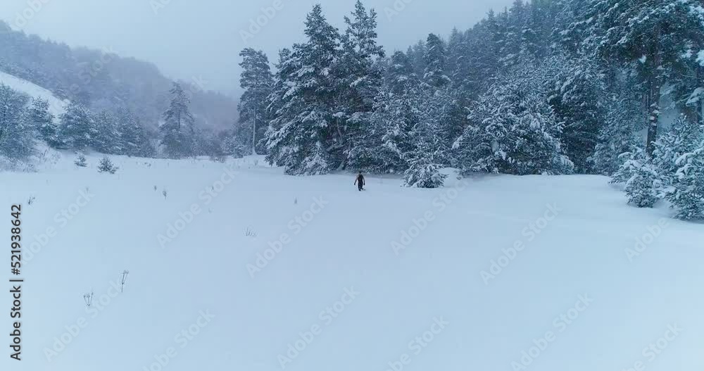 The man walking on the white snow.
Man walking on snow in cold winter season.
The man walking on the white snow.
Man walking on snow in cold winter season.