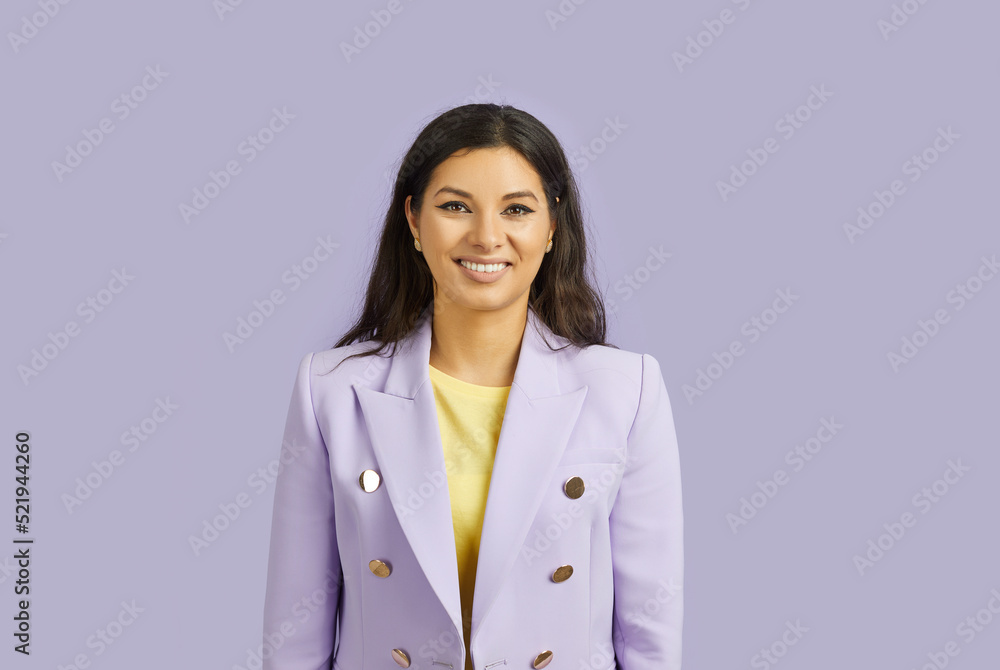 Close-up portrait of charming sweet straight-haired brunette lady wearing purple jacket with smile on face, natural expression. Isolated over purple violet pastel background. Copy space Close-up portrait of charming sweet straight-haired brunette lady wearing purple jacket with smile on face, natural expression. Isolated over purple violet pastel background. Copy space
