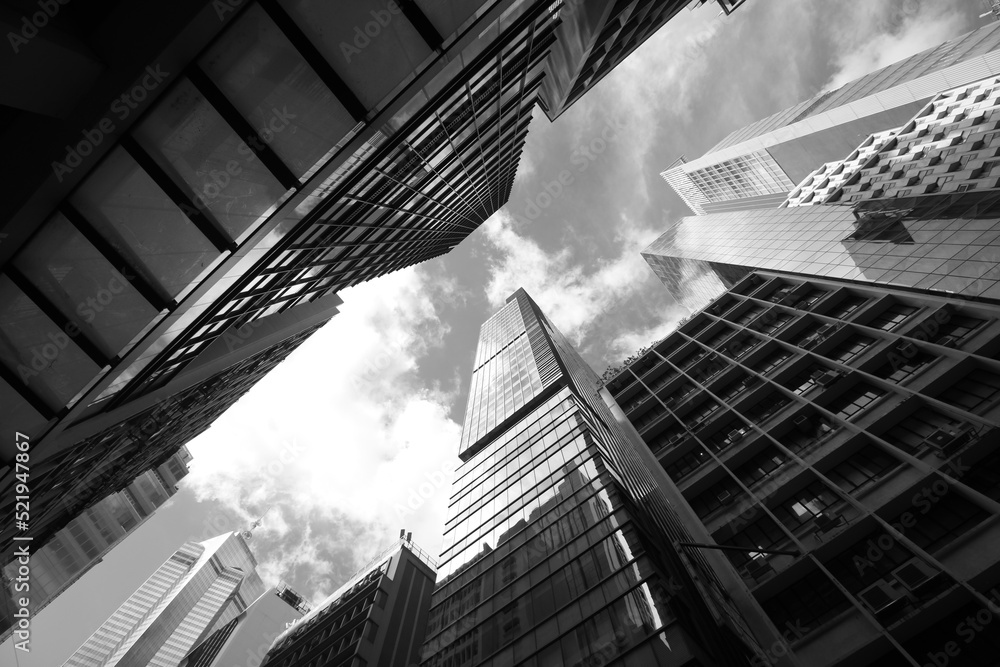 Low angle view of modern office buildings in Hong Kong, Black and white
