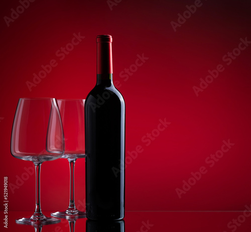 Red wine glasses and bottle