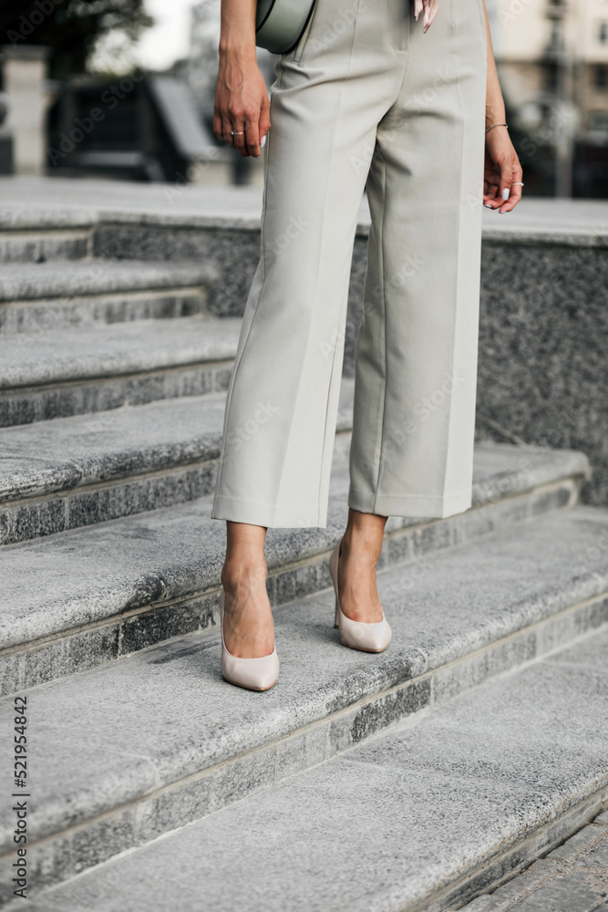 elegant lady in trousers and shoes elegant lady in trousers and shoes