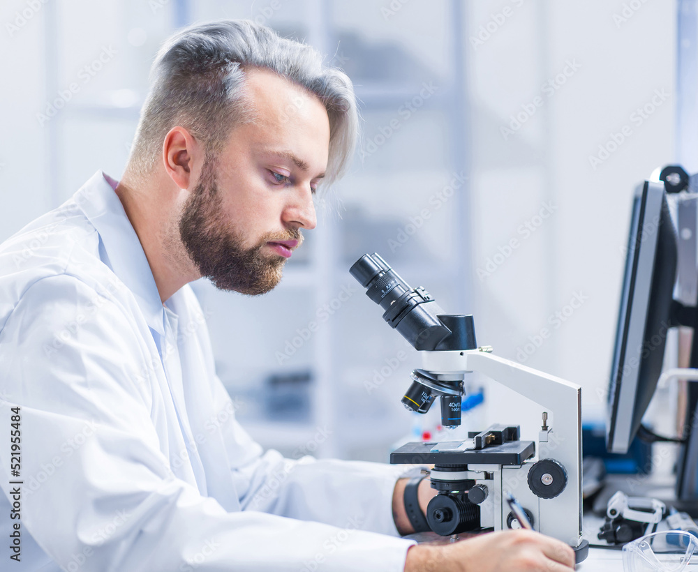Professional Doctors Doing Monkeypox Research in a Modern Futuristic Laboratory. Lab Experiments in Clinic Hospital. Science and Medicine Concept. Professional Doctors Doing Monkeypox Research in a Modern Futuristic Laboratory. Lab Experiments in Clinic Hospital. Science and Medicine Concept.