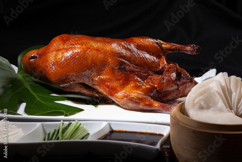 Famous food in Beijing, China, Peking duck, duck roasted with fruit wood
