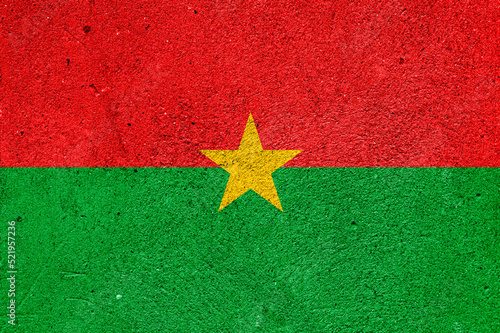 State flag of Burkina Faso on a plaster wall