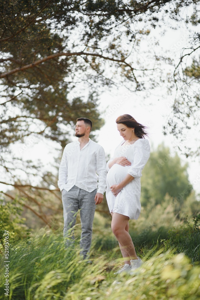 Portrait of lovely future parents during sunset Portrait of lovely future parents during sunset