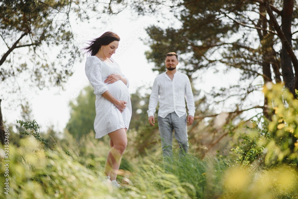 Portrait of lovely future parents during sunset Portrait of lovely future parents during sunset