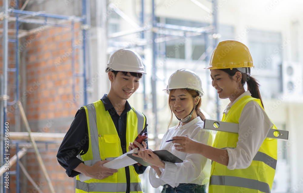 Professional Construction and Engineer team Working on workplace. Professional black architect and construction worker working look at blueprint plan on site. Professional Construction and Engineer team Working on workplace. Professional black architect and construction worker working look at blueprint plan on site.