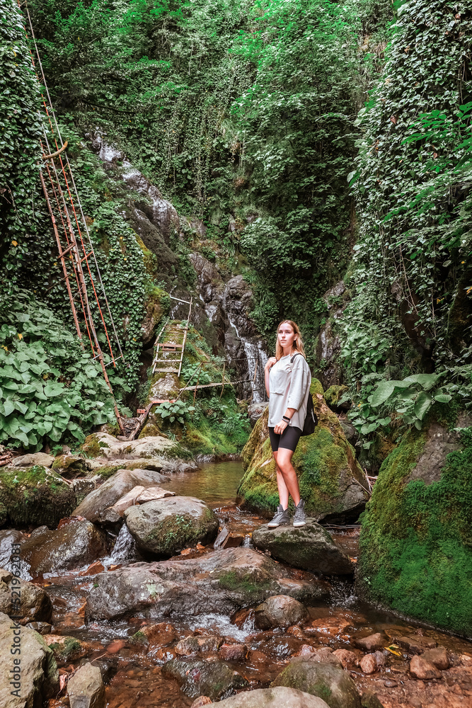 Travel. Girl travels through the mountains and waterfalls of wild nature. Unity, mental health, eco travel. Hiking in the mountains, van life vibes, travelling,good moments, digital detox Travel. Girl travels through the mountains and waterfalls of wild nature. Unity, mental health, eco travel. Hiking in the mountains, van life vibes, travelling,good moments, digital detox