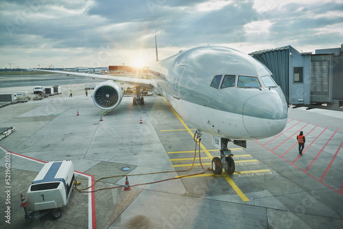 Germany, Hesse, Frankfurt, Commercial airplane waiting on airport tarmac photo