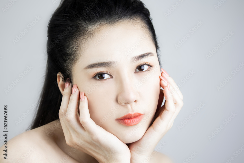 Portrait of Asian woman with a beautiful face and fresh skin. Smooth and natural lip color lipstick with bright eyes. Cute models natural makeup and sparkling eyes, facials, makeup, beauty and spa. Portrait of Asian woman with a beautiful face and fresh skin. Smooth and natural lip color lipstick with bright eyes. Cute models natural makeup and sparkling eyes, facials, makeup, beauty and spa.