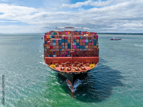Fully Loaded Container Ship at Sea Transporting Cargo Around the World