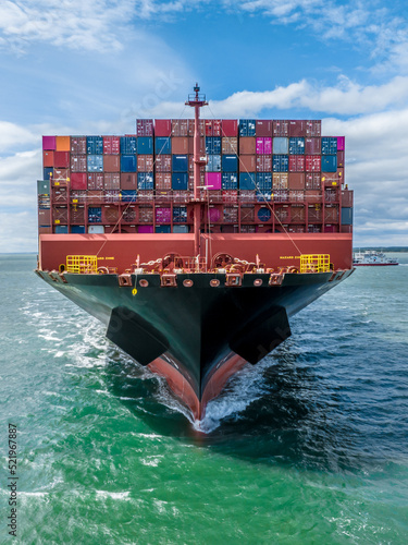 Fully Loaded Container Ship at Sea Transporting Cargo Around the World