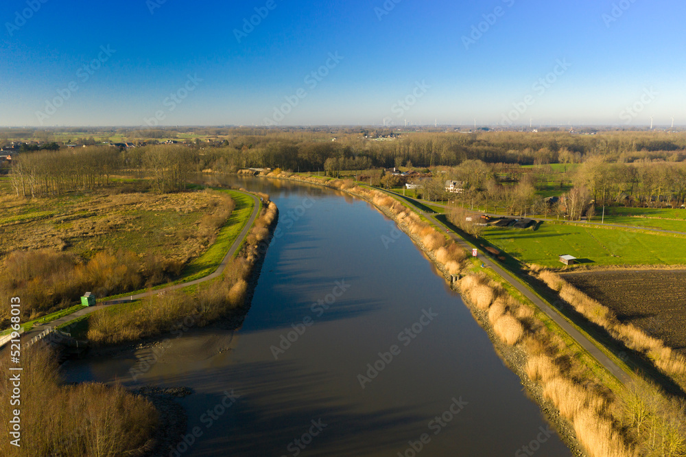 Aerial view of the Scheldt river, in Wichelen, Belgium