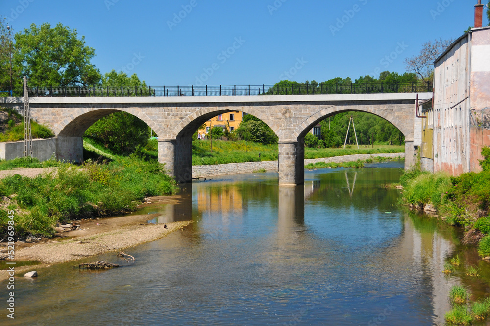 Kwisa river and bridge in Gryfow Slaski, city in Lower Silesian Voivodeship, Poland.