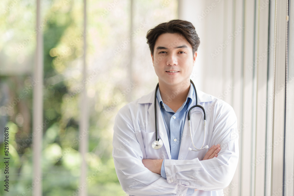 Asian doctor man portrait in professional uniform standing with smile and confidence. Asian doctor man portrait in professional uniform standing with smile and confidence.