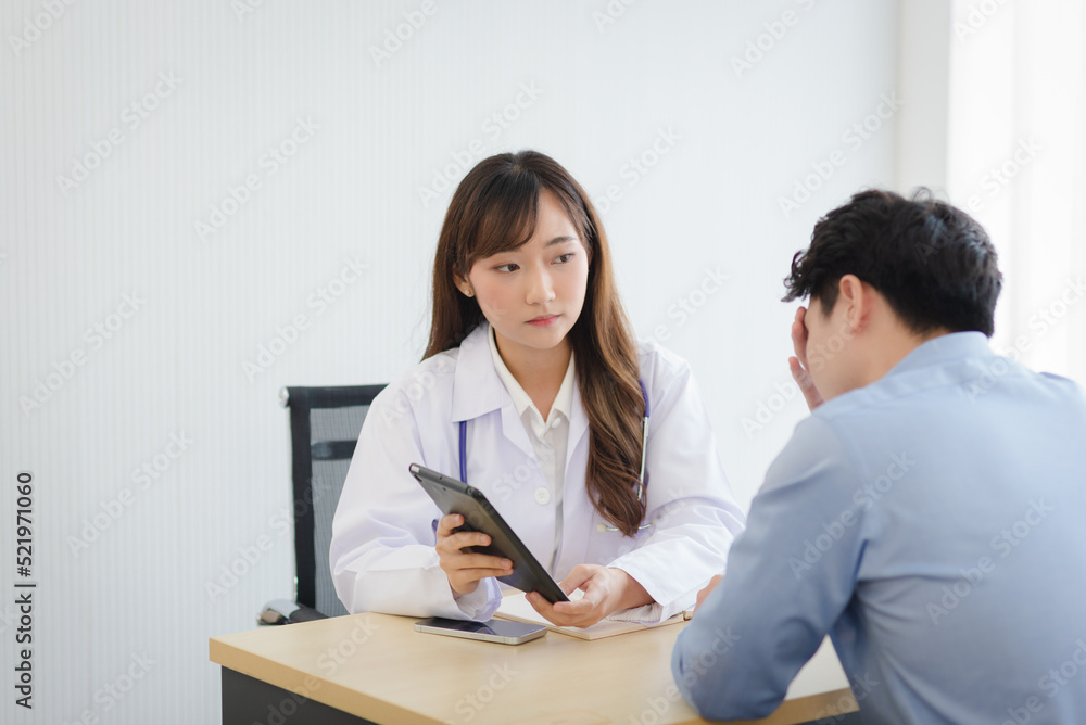 Asian doctor woman examining and diagnose the patient in modern room. Asian doctor woman examining and diagnose the patient in modern room.