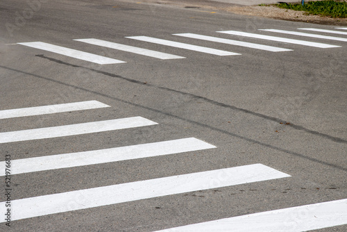 Crosswalk on the asphalt road. Zebra. Road Safety comcept