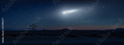 Foto blue night sky over desert with falling stars and moon