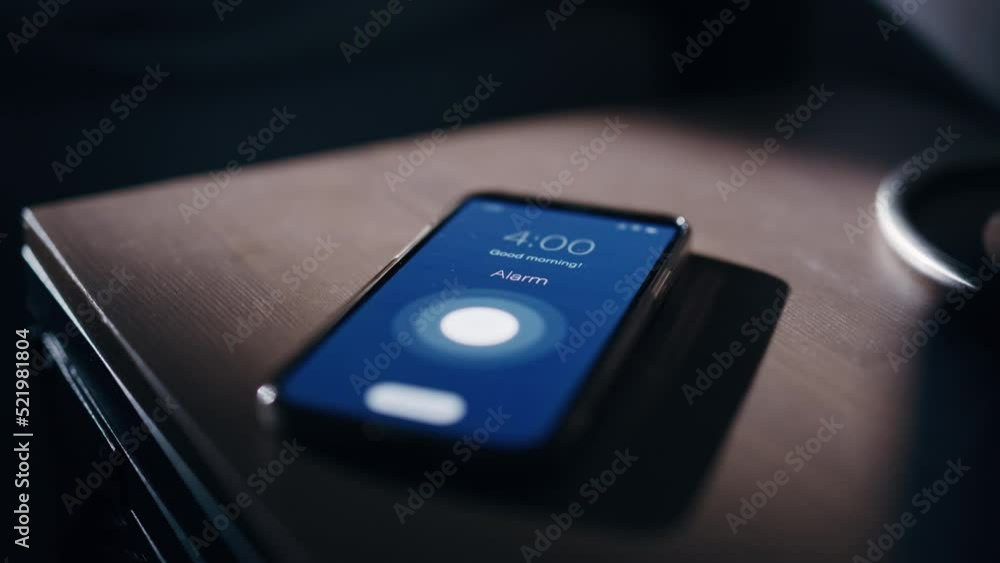 Smartphone Alarm Clock App Rings for Wake up, Screen Shows Smartphone Alarm Clock App Rings for Wake up, Screen Shows