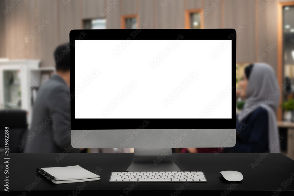 Workspace with simulated blank white screen computers and office equipment on a wooden table. Workspace with simulated blank white screen computers and office equipment on a wooden table.