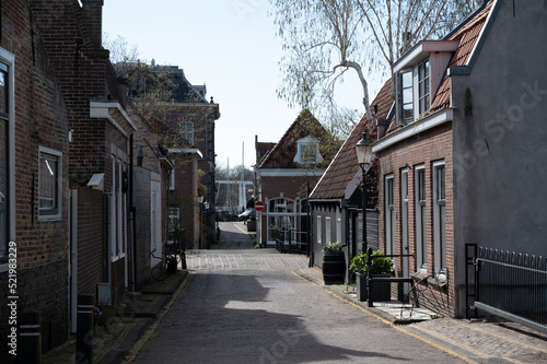 Old streets and houses of historival Dutch town Enkhuizen, Horth-Holland, Netherlands