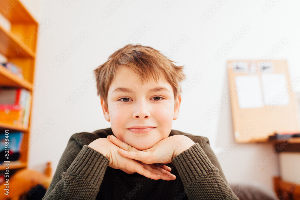 Home schooling boy in video chat camera