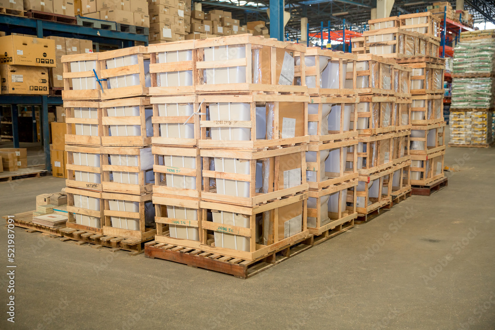 stack of materials in large warehouse with the boxes wrapped with wooden crate on wooden pallet ready to ship to customer stack of materials in large warehouse with the boxes wrapped with wooden crate on wooden pallet ready to ship to customer