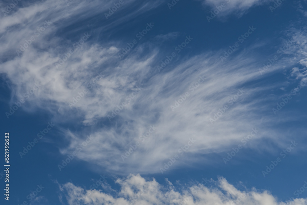 cirrus and layered clouds in the sky
