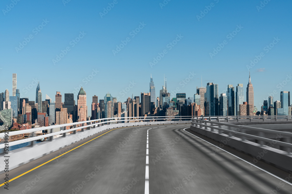 Fototapeta premium Empty urban asphalt road exterior with city buildings background. New modern highway concrete construction. Concept of way to success. Transportation logistic industry fast delivery. New York. USA.