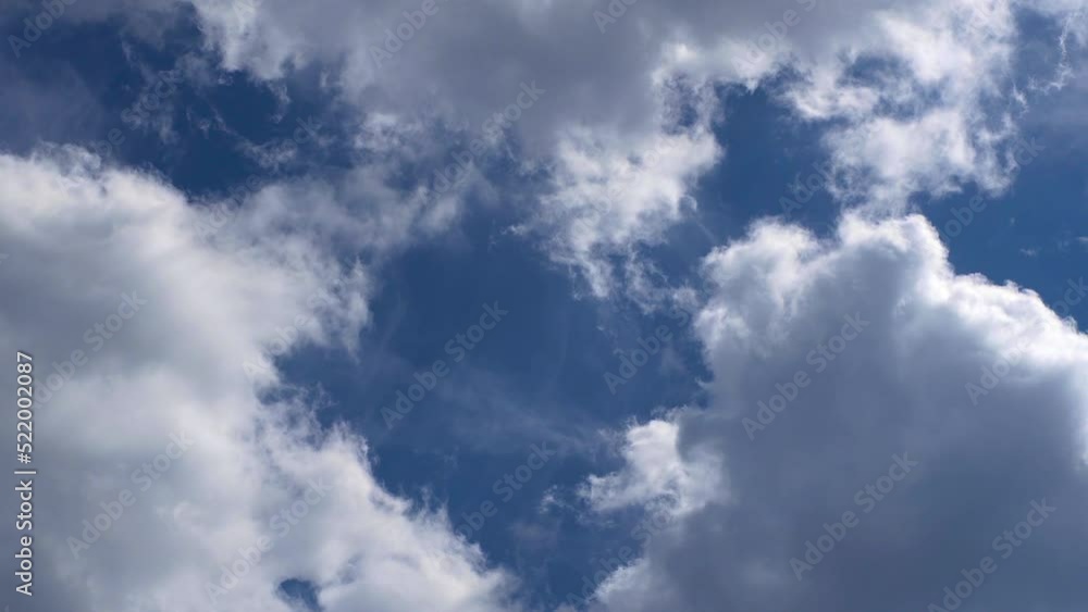 Timelapse of clouds on deep blue sky background. Timelapse of clouds on deep blue sky background.