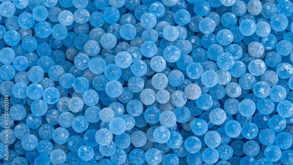 Lots of frosted blue glass ball poured into the ground for foot massage Lots of frosted blue glass ball poured into the ground for foot massage