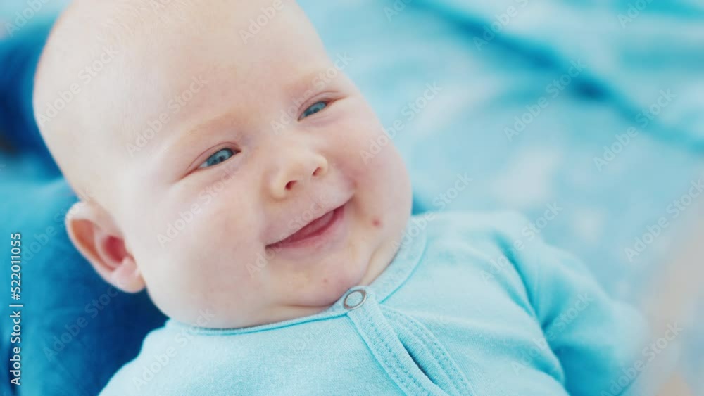 Portrait of happy infant baby smiling on mother's hands Portrait of happy infant baby smiling on mother's hands
