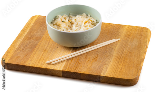 bowl of noodle on wooden tray