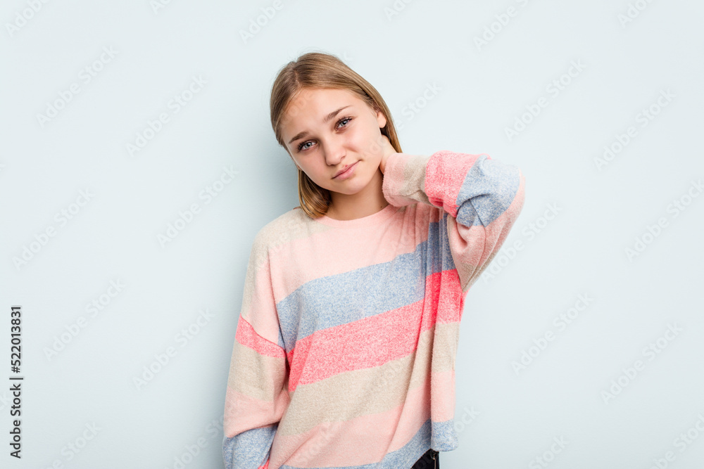 Young caucasian girl isolated on blue background suffering neck pain due to sedentary lifestyle. Young caucasian girl isolated on blue background suffering neck pain due to sedentary lifestyle.