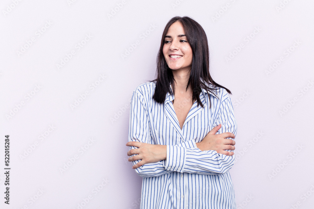 Young caucasian woman isolated on pink background smiling confident with crossed arms. Young caucasian woman isolated on pink background smiling confident with crossed arms.
