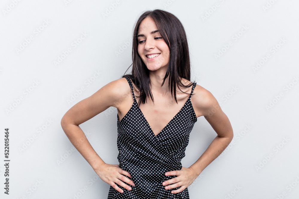 Young caucasian woman isolated on white background confident keeping hands on hips. Young caucasian woman isolated on white background confident keeping hands on hips.