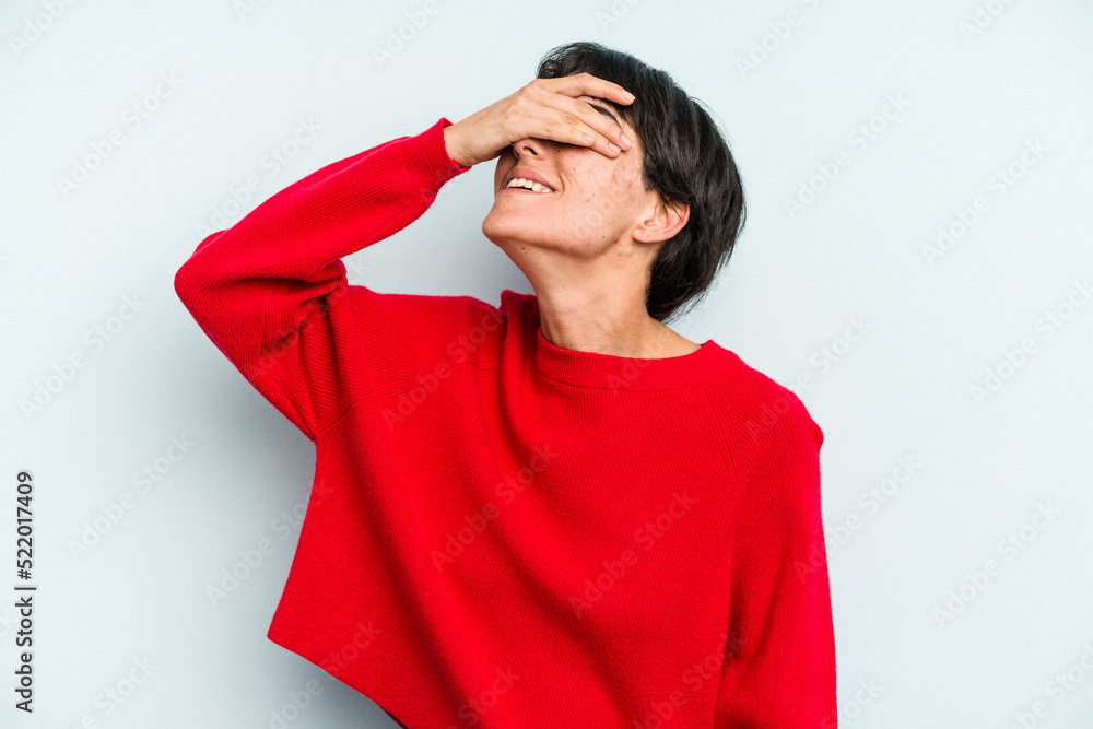 Young caucasian woman with a short hair cut isolated laughs joyfully keeping hands on head. Happiness concept. Young caucasian woman with a short hair cut isolated laughs joyfully keeping hands on head. Happiness concept.