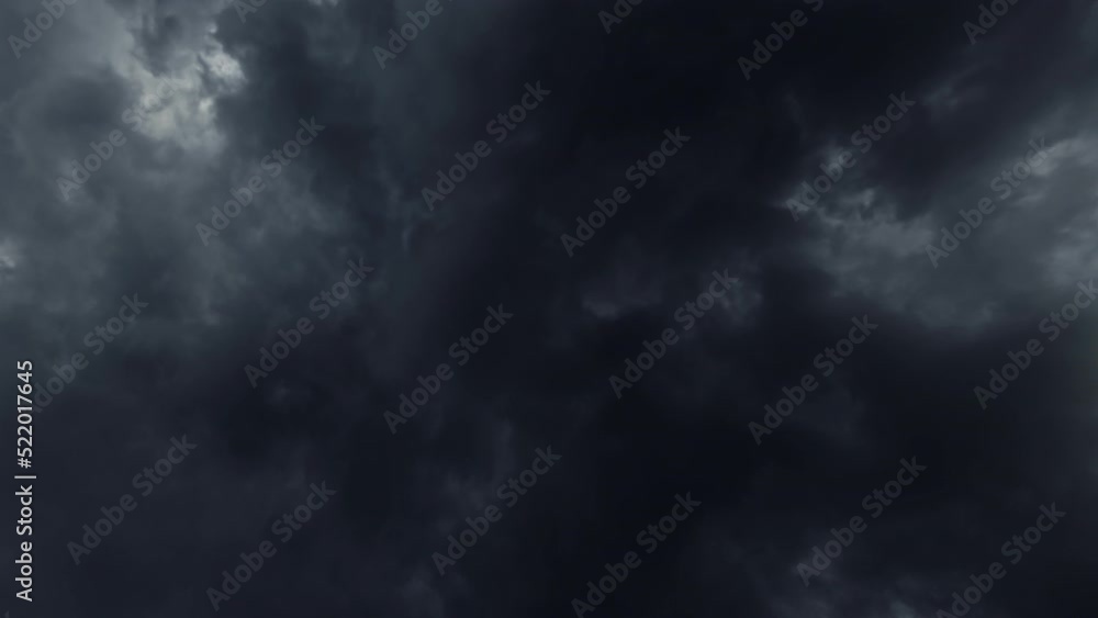 Black cloudy sky. Storm weather. Aerial view. Thundery dark dense clouds covering heaven flying through fast motion. Black cloudy sky. Storm weather. Aerial view. Thundery dark dense clouds covering heaven flying through fast motion.