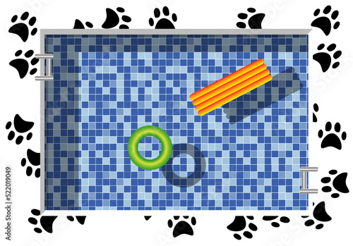 Vista aérea de piscina con estampado de huellas de oso negras en su borde, fondo de teselas en tonos azules, y un flotador verde y una colchoneta naranja y amarilla.. Verano en la piscina photo