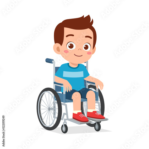 little kid sit on wheelchair and feel happy