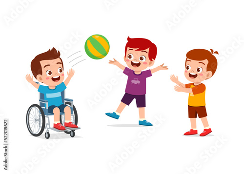 little kid on wheelchair play ball with friend