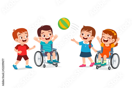 little kid on wheelchair play ball with friend