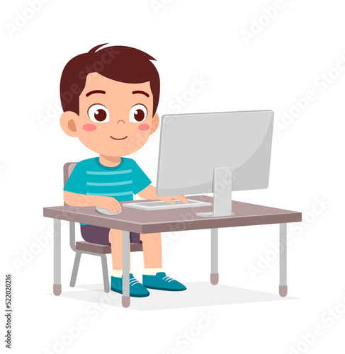 cute little kid use computer to study internet